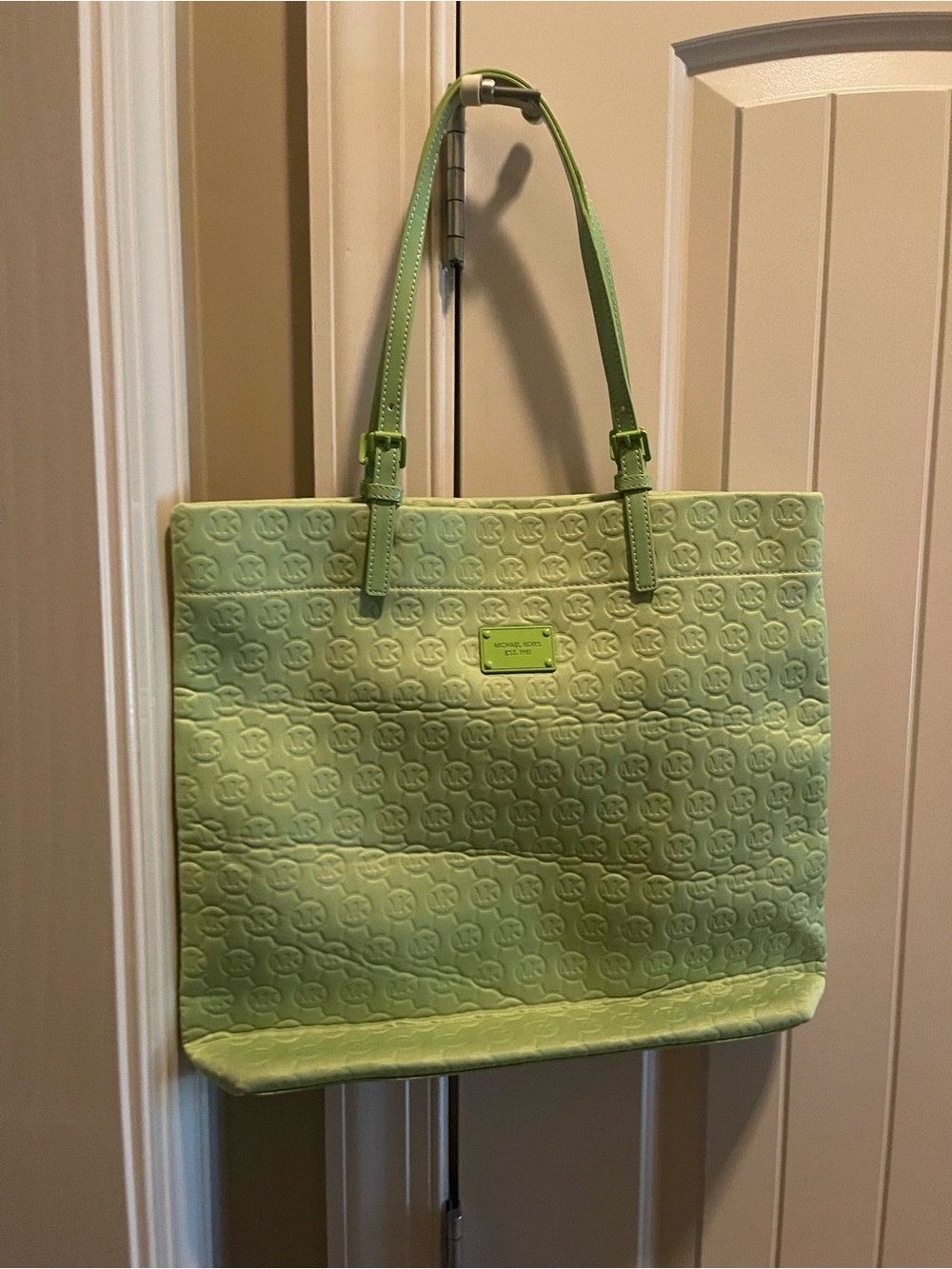 Green Quilted Tote Bag with Logo Plaque